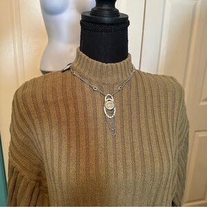 Nicole Miller Silver Necklace with Pendent and White‎ Stone
NM22202